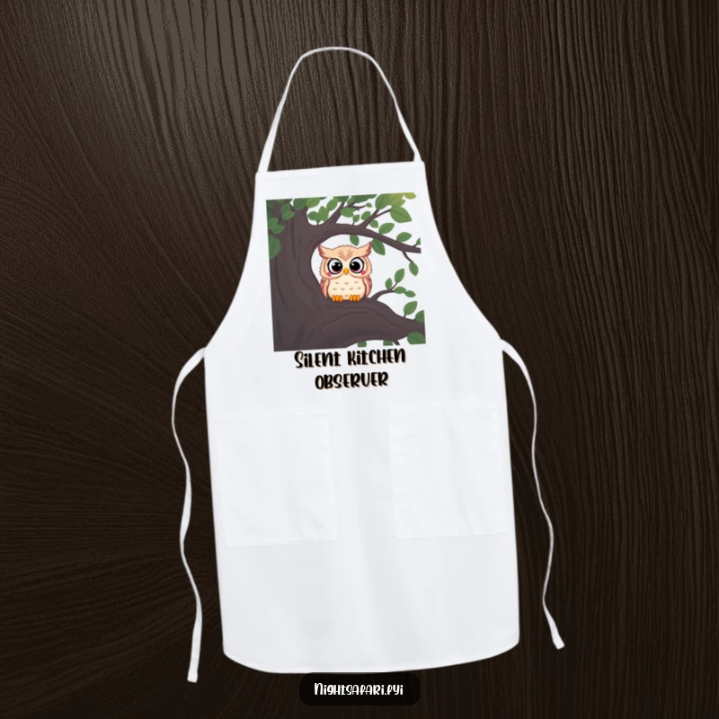 Funny apron with a curious owl, wide eyes peering from a shadowy tree branch, for kitchen use.