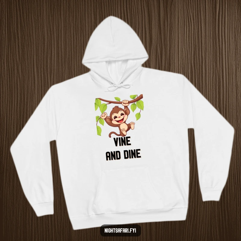 Funny Monkey Hoodie: Delighted monkey swinging from a vine with a wide smile, comfortable and fun.