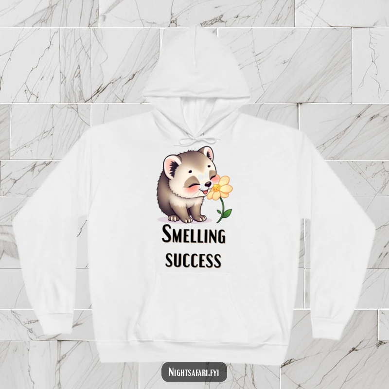 Funny hoodie featuring a happy civet cat sniffing a glowing flower, offering cozy comfort and natural wonder.