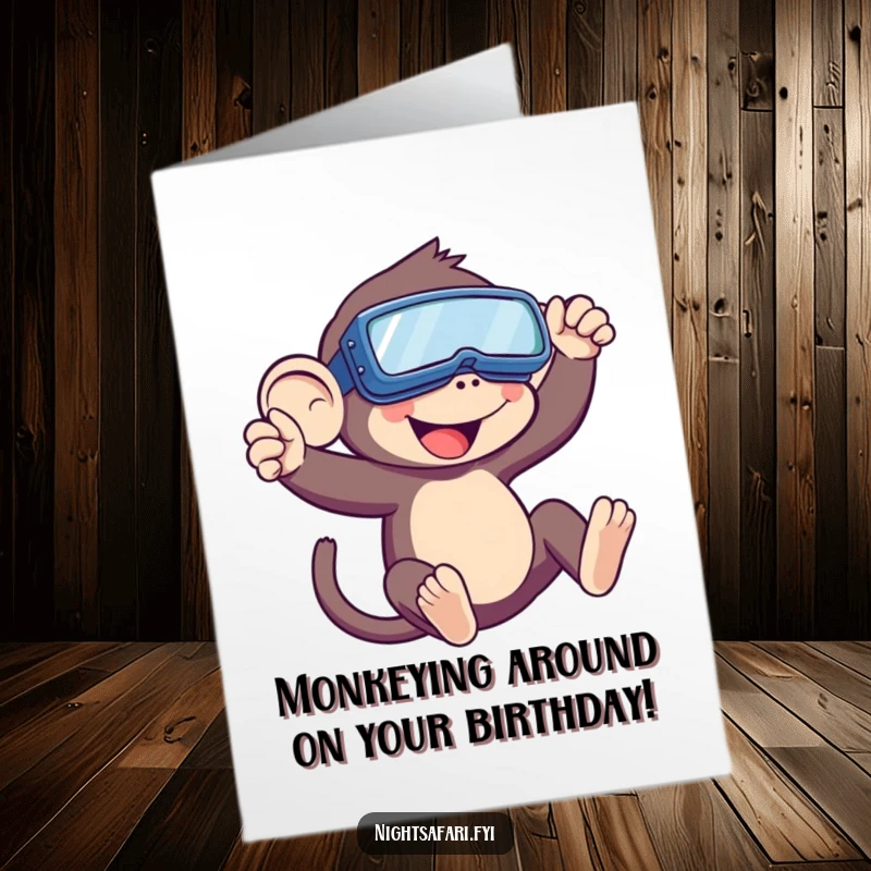 Funny Free Printable Birthday Card: Playful monkey in night vision goggles swinging, ready for a wild birthday bash. Downloadable card.
