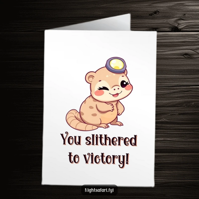 Free Printable Congratulations Card: A winking pangolin with a headlamp, slithering in celebration, a humorous way to say congrats.
